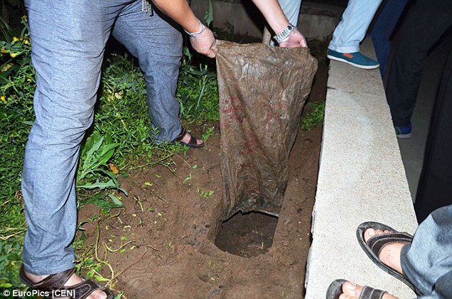 2BB34A6000000578-3212645-The_boy_s_body_was_found_on_July_26_It_was_buried_inside_a_large-a-46_1440671300285