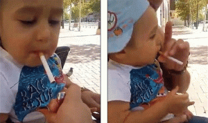 بالفيديو..  طفل يدخن ويشرب كحول!