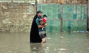 إجلاء 500 أسرة نازحة بسبب الأمطار في العراق