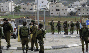 قوات إسرائيلية تعتقل 16 فلسطينياً في الضفة