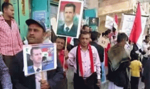 بالصور… الحوثيون يرفعون صور الأسد في صنعاء