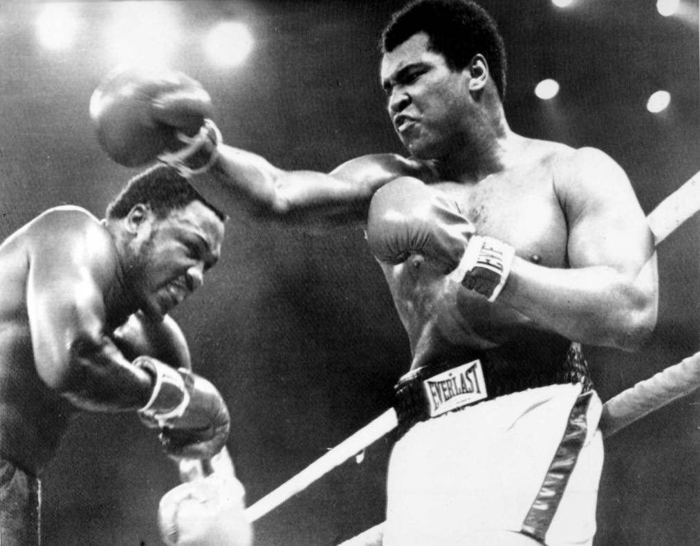 Sport, Boxing, Manila, Philippines, pic: 1st October 1975, World Heavyweight Championship, The "Thrilla in Manila", Seventh Round, Heavyweight Champion Muhammad Ali, right who beat challenger Joe Frazier on a TKO, in the 14th round (Photo by Rolls Press/Popperfoto/Getty Images)