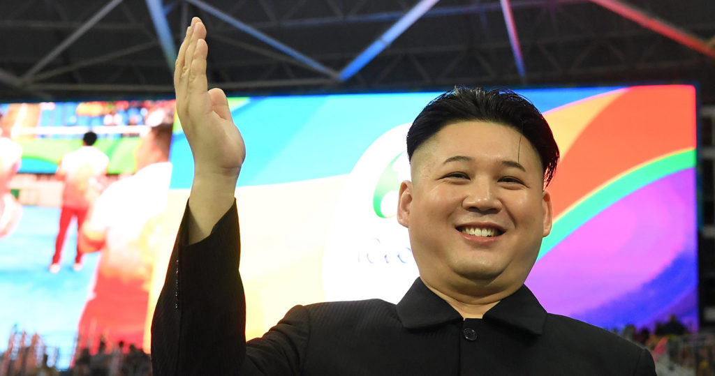 epa05497561 A look-alike of North Korean President Kim Jong-un poses in the stands prior to the start of the evening session of the Rio 2016 Olympic Games Athletics, Track and Field events at the Olympic Stadium in Rio de Janeiro, Brazil, 18 August 2016. EPA/BERND THISSEN