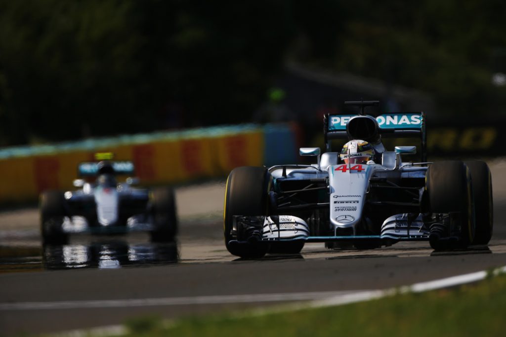 Hungaroring, Budapest, Hungary. Sunday 24 July 2016. Lewis Hamilton, Mercedes F1 W07 Hybrid, leads Nico Rosberg, Mercedes F1 W07 Hybrid. World Copyright: Andy Hone/LAT Photographic ref: Digital Image _ONY4878