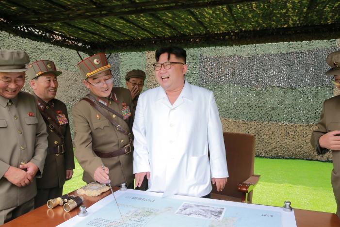 FILE PHOTO - North Korean leader Kim Jong Un provides field guidance during a fire drill of ballistic rockets by Hwasong artillery units of the KPA Strategic Force, in this undated photo released by North Korea's Korean Central News Agency (KCNA) in Pyongyang September 6, 2016. KCNA/Files via Reuters