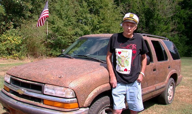 man-covers-car-in-pennies