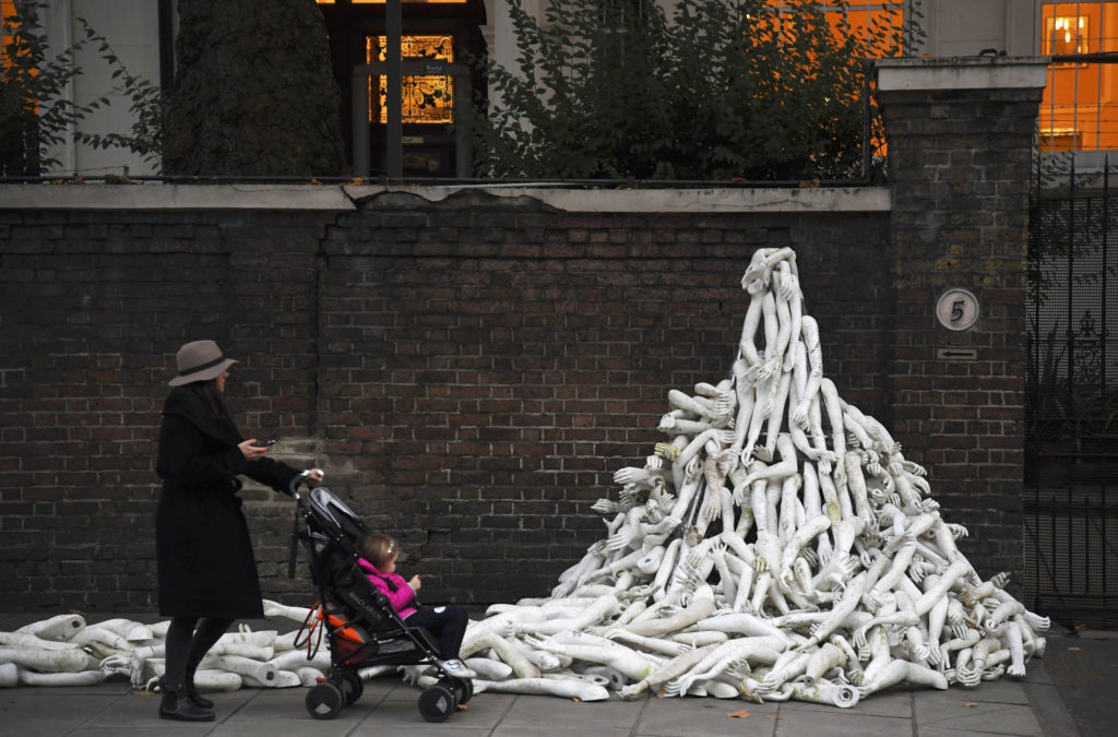 Piles on mannequin limbs are seen outside the Russia's embassy in London as part of a protest against military action in Syria, November 3, 2016. REUTERS/Toby Melville