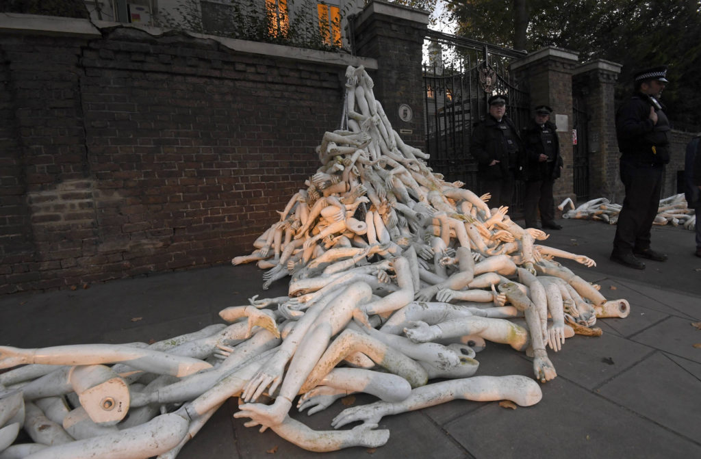 Piles on mannequin limbs are seen outside the Russia's embassy in London as part of a protest against military action in Syria, November 3, 2016. REUTERS/Toby Melville