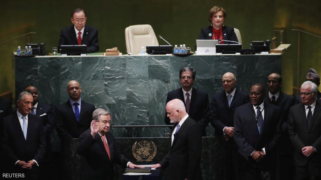 United Nations Secretary General Ban Ki-moon (back L) and Portugal's President Marcelo Rebelo de Sousa (L) watch as Secretary-General-designate Mr. Antonio Guterres of Portugal is sworn in by President of the UN General Assembly Peter Thomson (R) at UN headquarters in New York, U.S., December 12, 2016. REUTERS/Lucas Jackson