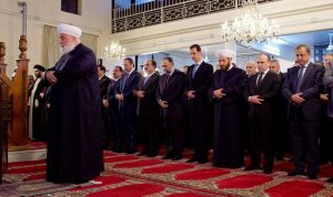 بالصور… الأسد يشارك في احتفال المولد النبوي في دمشق