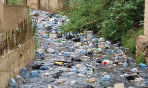صورة فاضحة للنفايات في نهر الغدير