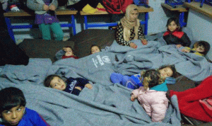 إجلاء أكثر من 500 لاجئ اجتاحت السيول خيمهم في السماقية