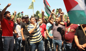 “مسيرة غضب” في نهر البارد احتجاجاً على قرار “العمل”
