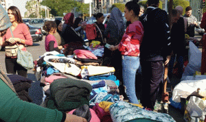  في ساحة إيليا.. معرض لبيع الملابس دعمًا للمحتاجين