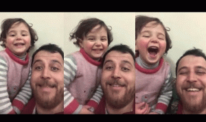 فى مشهد موثر.. أب سوري يواجه القذائف بالضحك مع ابنته (فيديو)