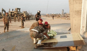 أجراس وآذان وتحية من الجيش مع مرور شهر على الانفجار (فيديو)