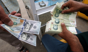 هبوط قياسي جديد للريال الإيراني مقابل الدولار