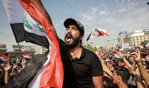 في العراق.. متظاهرون يحاولون اقتحام وزارة المالية