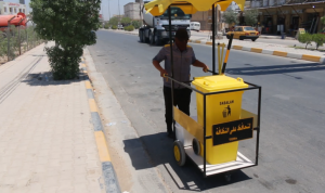 العراق.. عربات مظللة لحماية عمال النظافة من الحر