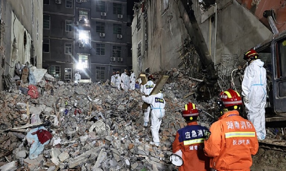 ضحايا بانهيار مبنى في الصين