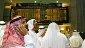 Emirati and Arab men discuss the stock r