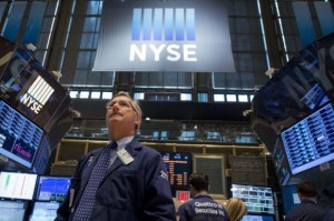 Traders work on the floor of the New York Stock Exchange