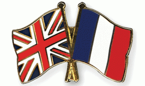 فرنسا وبريطانيا وقعتا اتفاقا بشأن مشكلة مهربي البشر